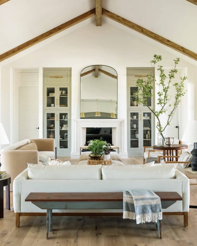 a living room with a fireplace and a couch